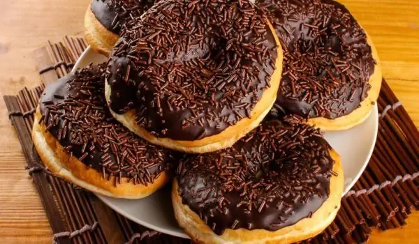 Vim Li Cas Donuts Tsis Muaj Lub Qhov? Keeb Kwm Thiab Legends Txog Lawv Keeb Kwm Thiab Daim Ntawv